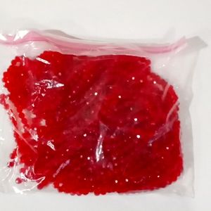 A Bag Of Dark Red Color Glass Beads (Weight is 2 Pounds)